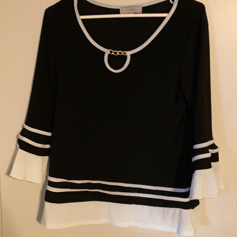 Black and white top with ruffle sleeves